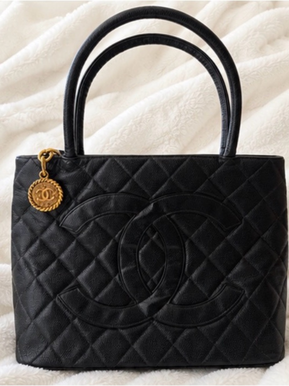 CHANEL Black Quilted Leather Tote with Gold CC Medallion